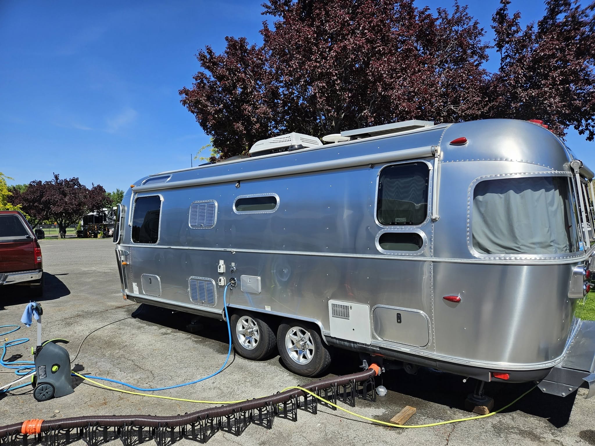 Polished Airstream trailer rear view